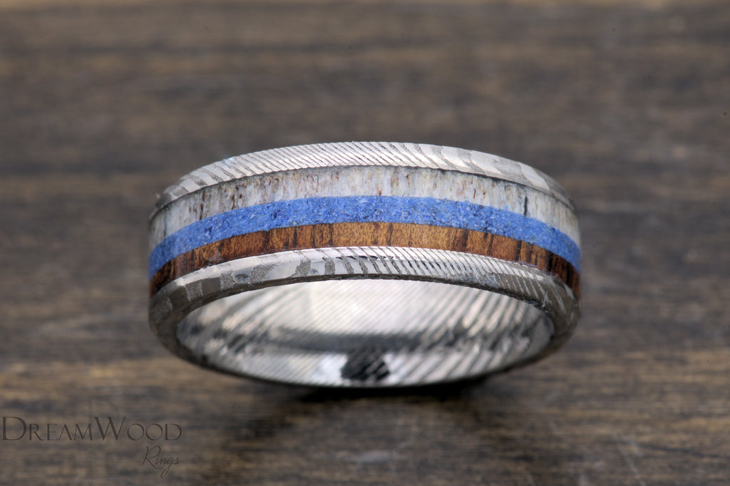 The Majestic Voyage - Damascus Steel Ring with Koa Wood, Lapis, and Antler Inlay - DreamWood Custom
